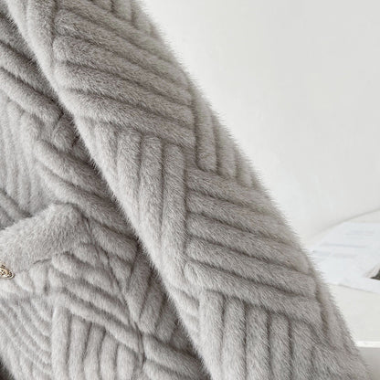 Light grey woven faux lamb fur coat – a subtle Chanel touch for a sophisticated and warm winter look